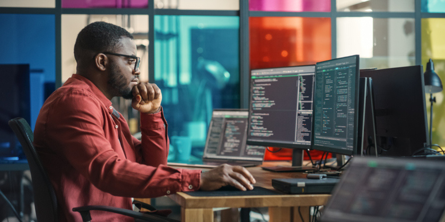 software developer writing code on computer