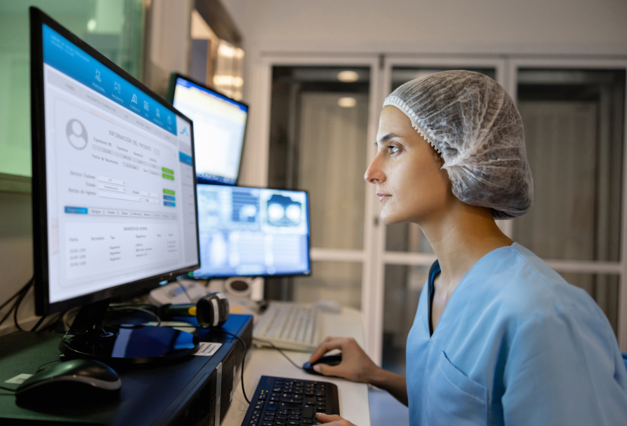 Female healthcare worker at computer