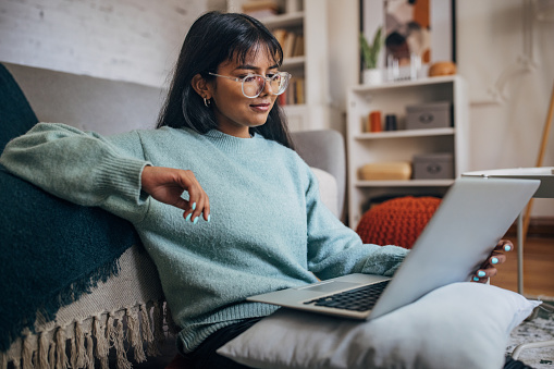 woman studying online at home