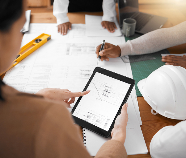 People working on an engineering planning proejct.